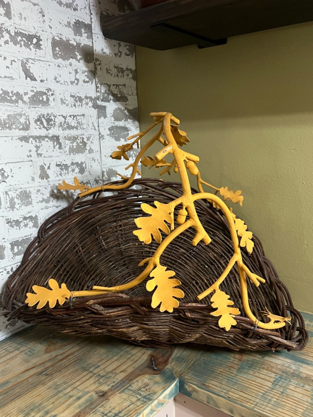 Vintage rustic dark woven wicker metal frame shaped leaves, & branches Basket